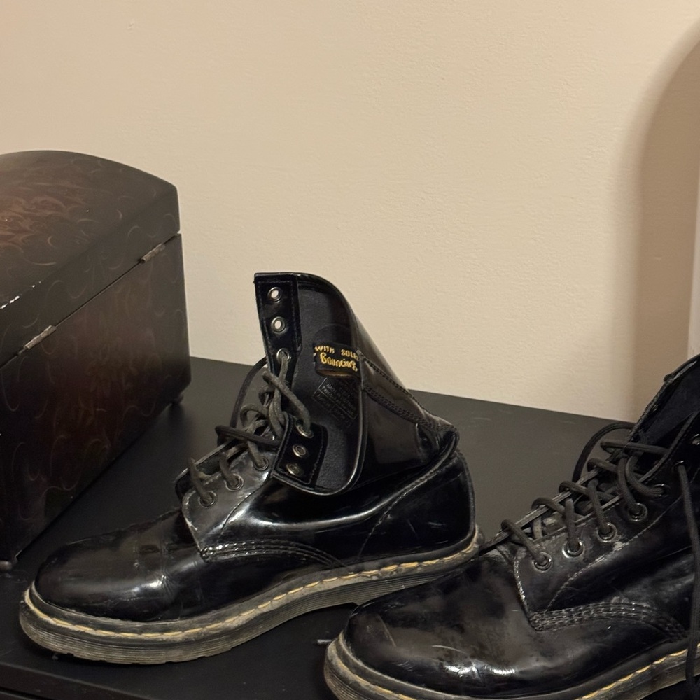 Dr. Martens Black Boots with Lace-Up Design and Chunky Sole